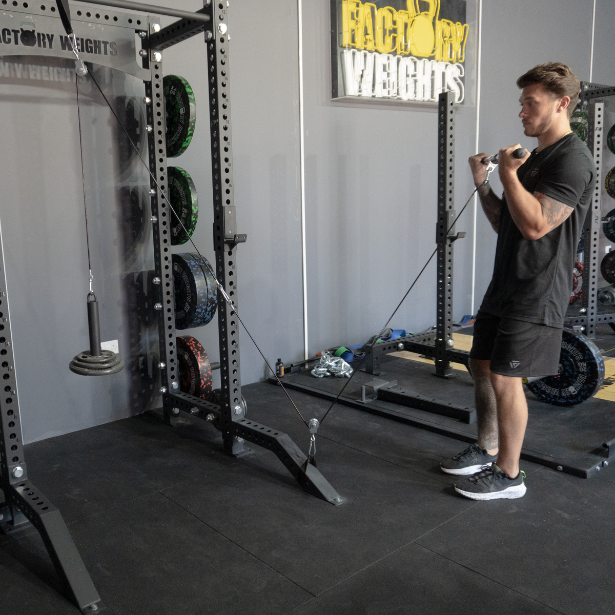 Workout cable clearance pulley system